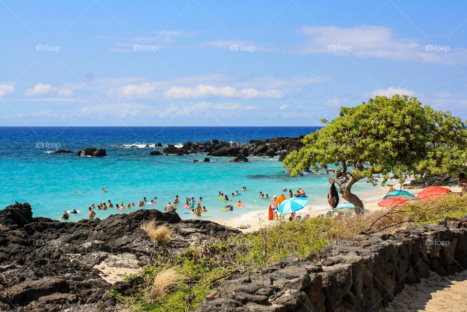 Beach surrounded by volcanic rock near Kona, Hawaii