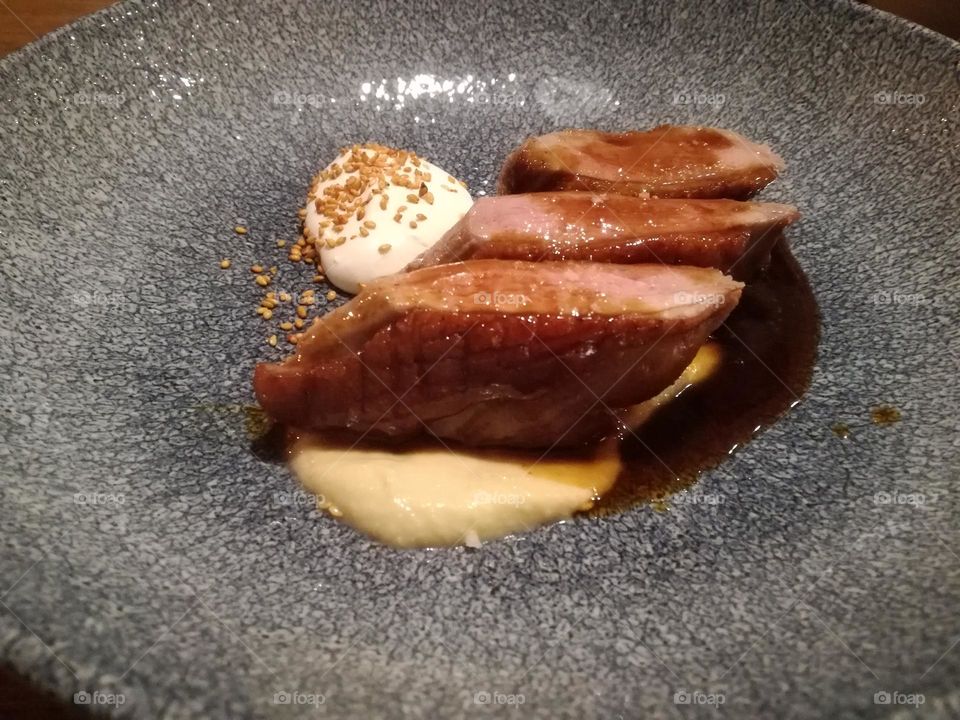 Duck breast at a very expensive restaurant.