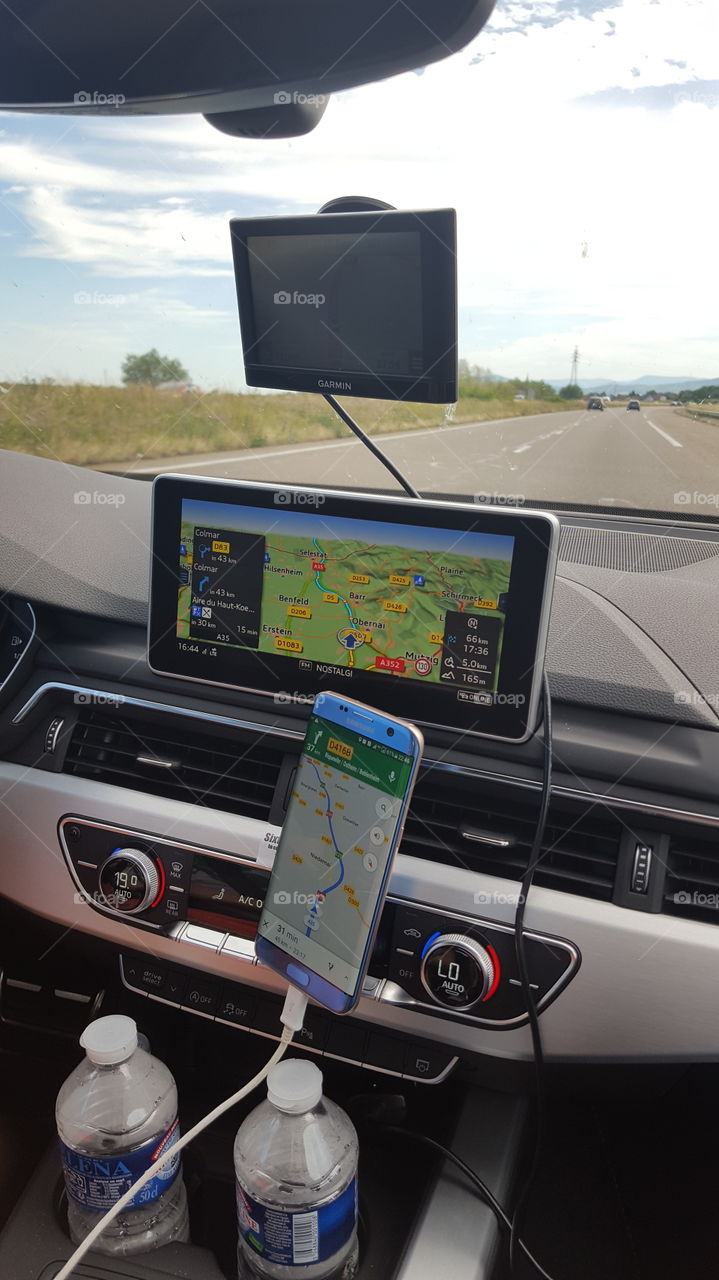 GPS overload - car with 3 GPS navigation systems activated