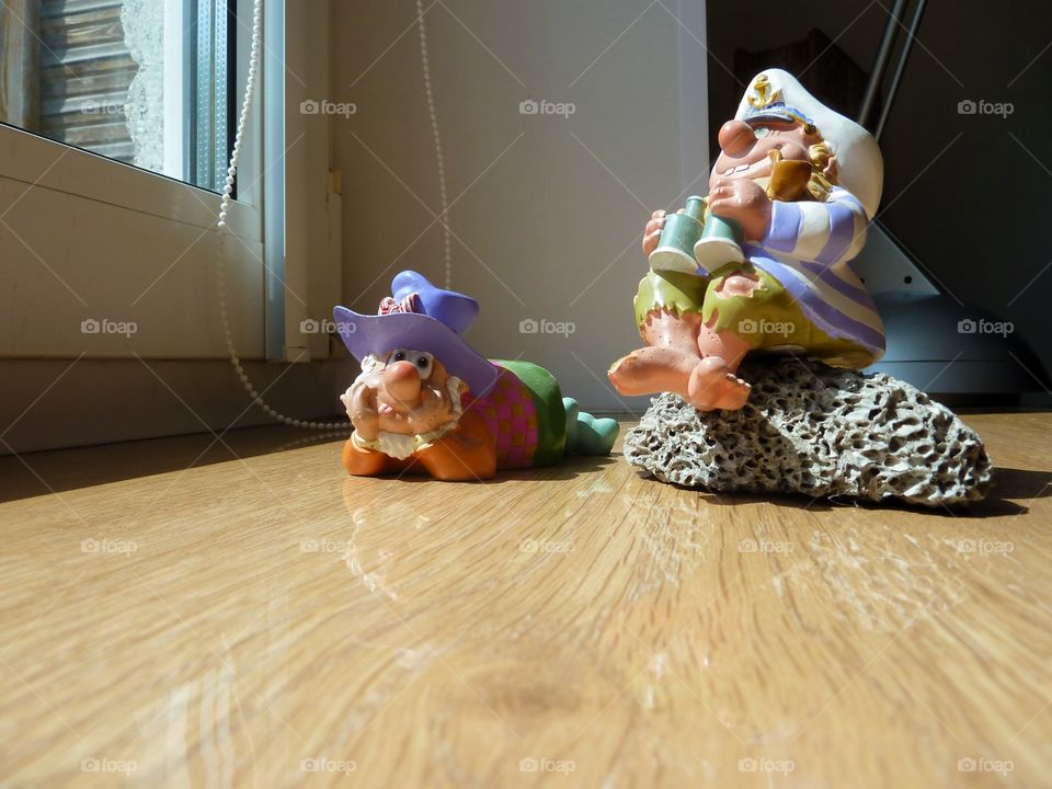figurines by the window