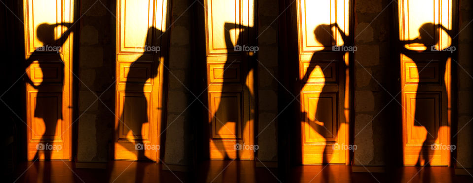Shadows on the doors, woman dancing 