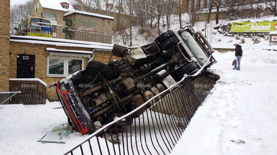 Garbage truck . A garbage truck slid over the edge