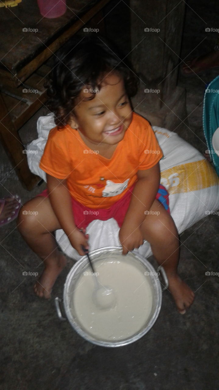 cheerful playing cookie dough