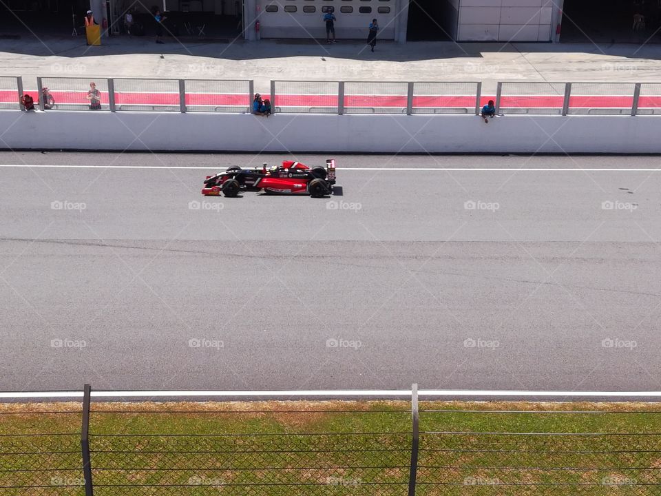 Open wheel racing car at Sepang intl circuit