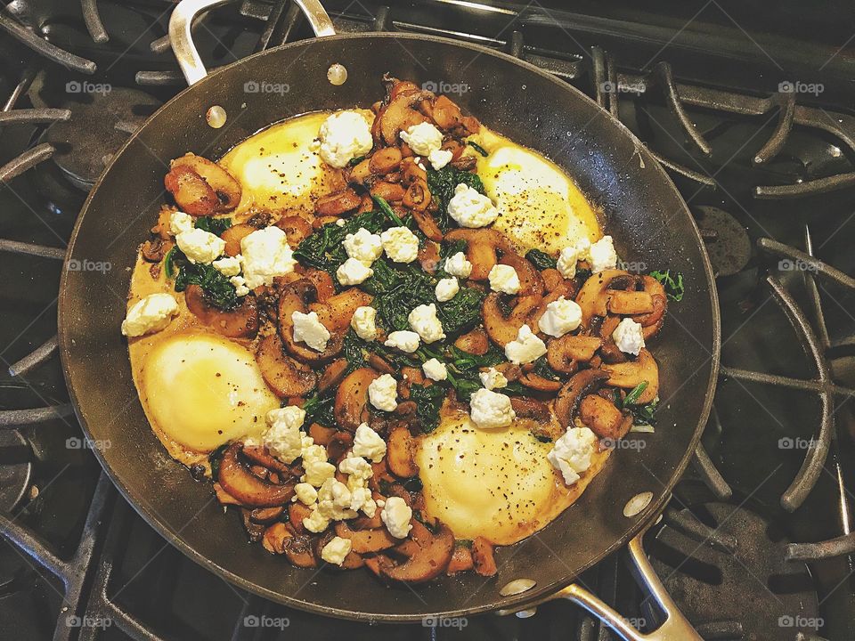 I have acute anaemia so I cooked this iron rich meal for dinner.... eggs, goat cheese, spinach and mushrooms