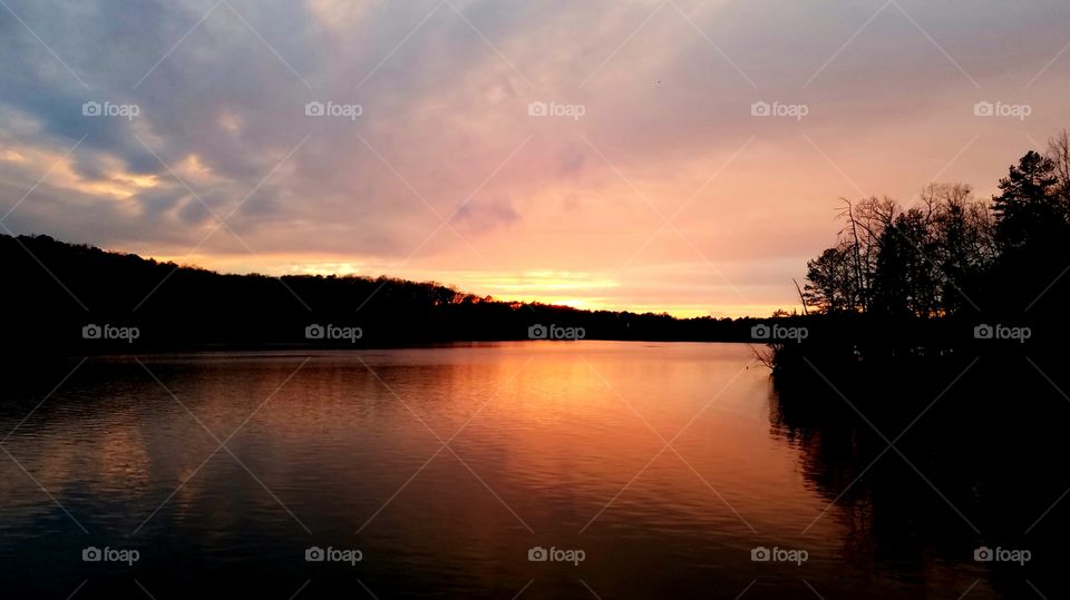 sunset over lake.