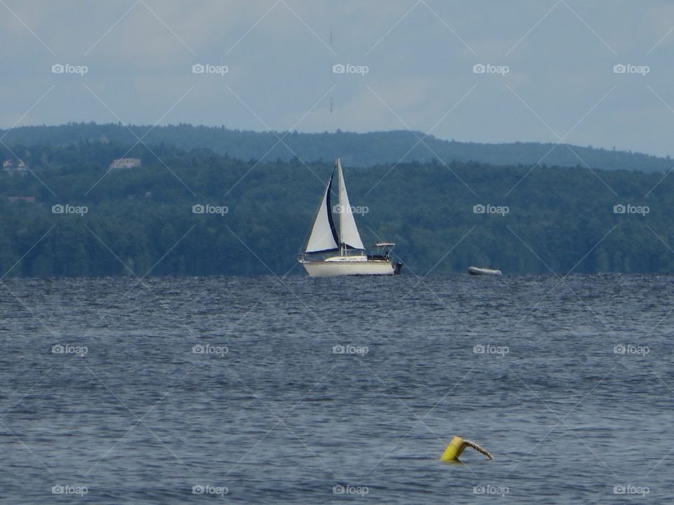 Sailing . Sailboat on Sebago Lake, Maine