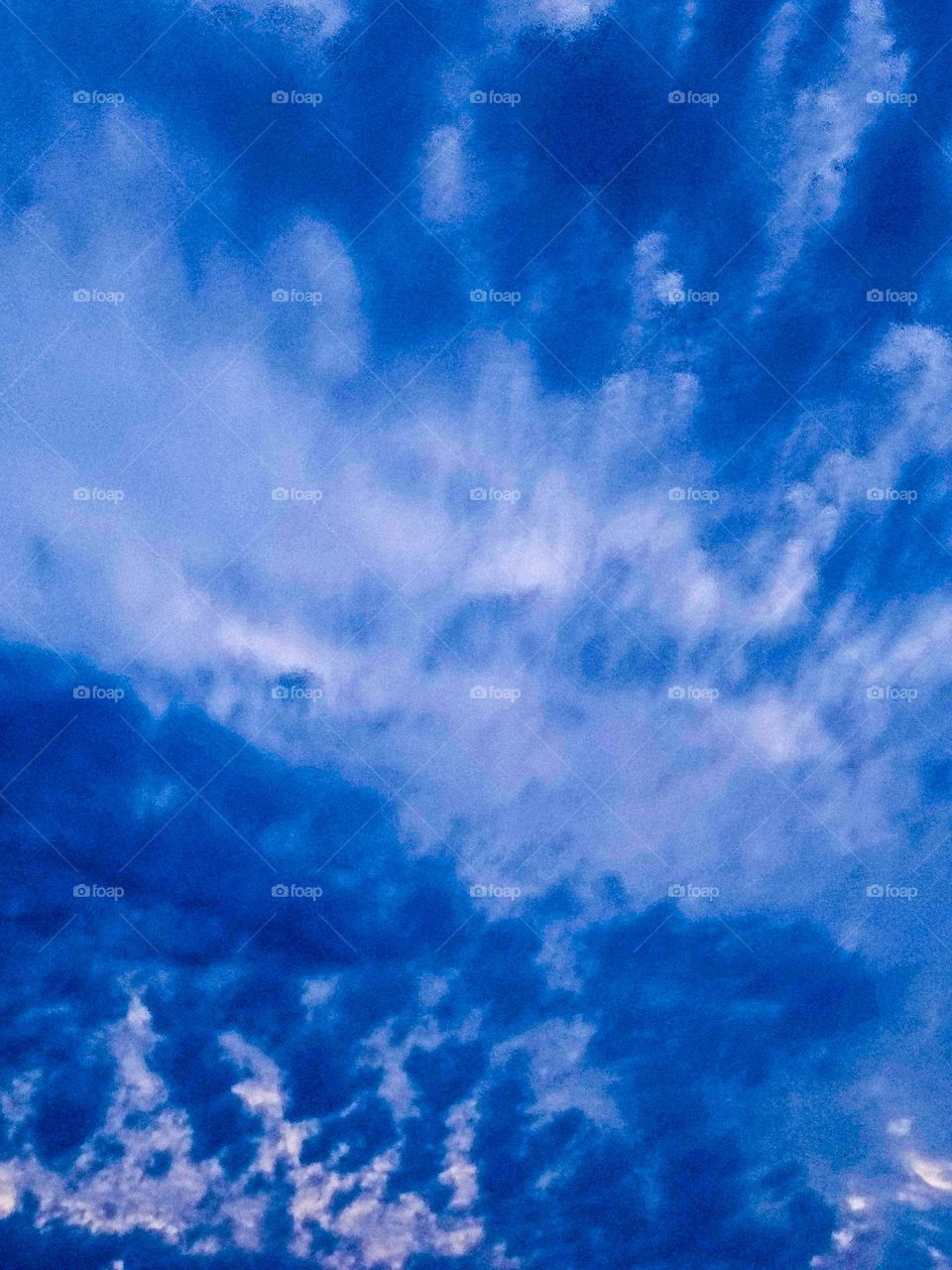 I want to show white clouds and blue sky in this photo.  The sky looks very beautiful with clouds and blue sky.