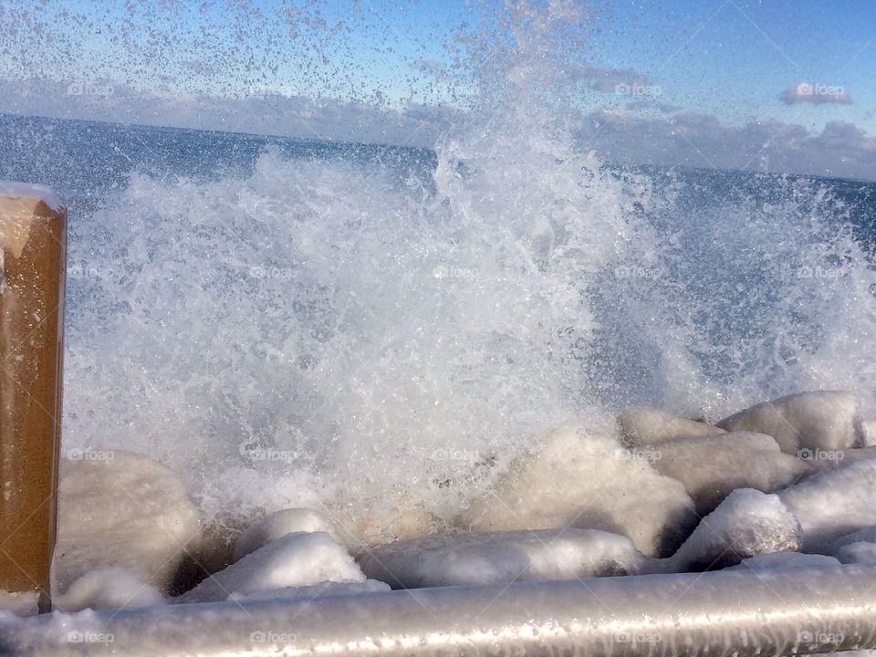 Splashing water icy rocks 