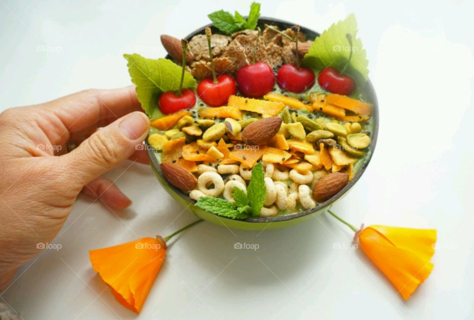 Fresh Fruit Smoothie Bowl - cheery, mango, banana, cereals,  seeds and nuts