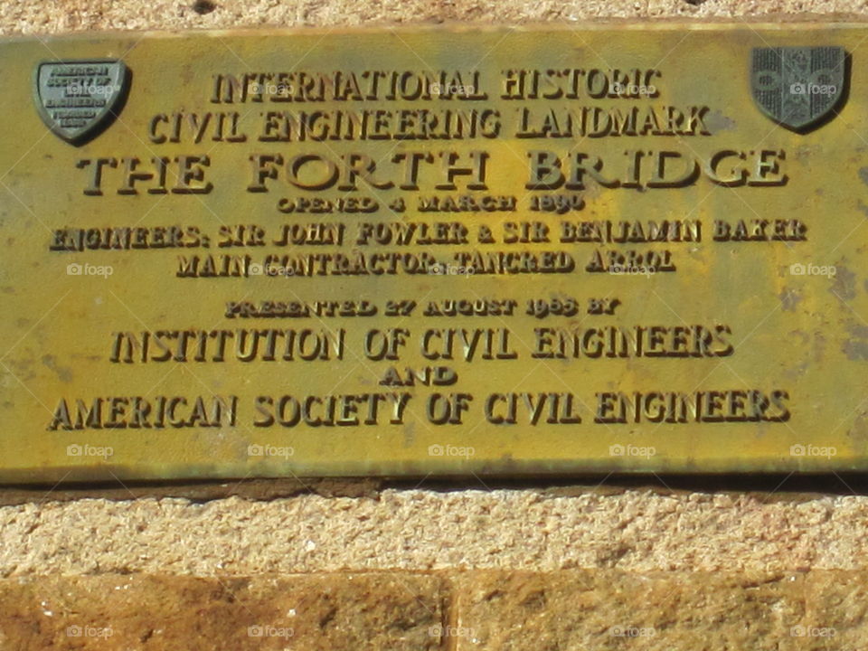 plaque on bridge
