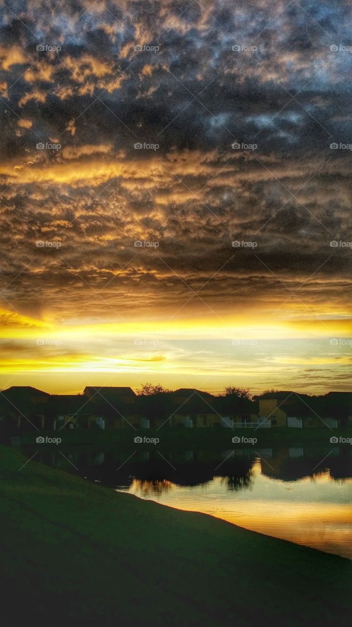 Reflection of houses in lake