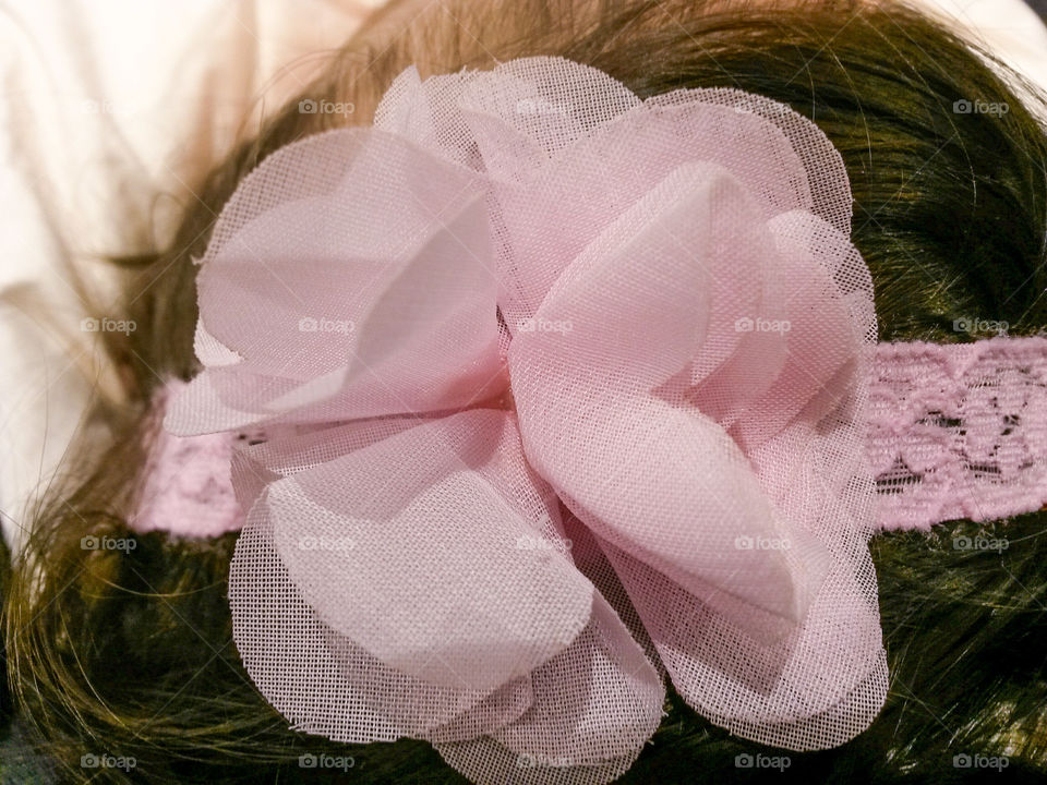 close up of fashionable baby pink bow