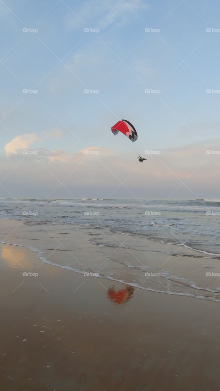 parachute over ocean