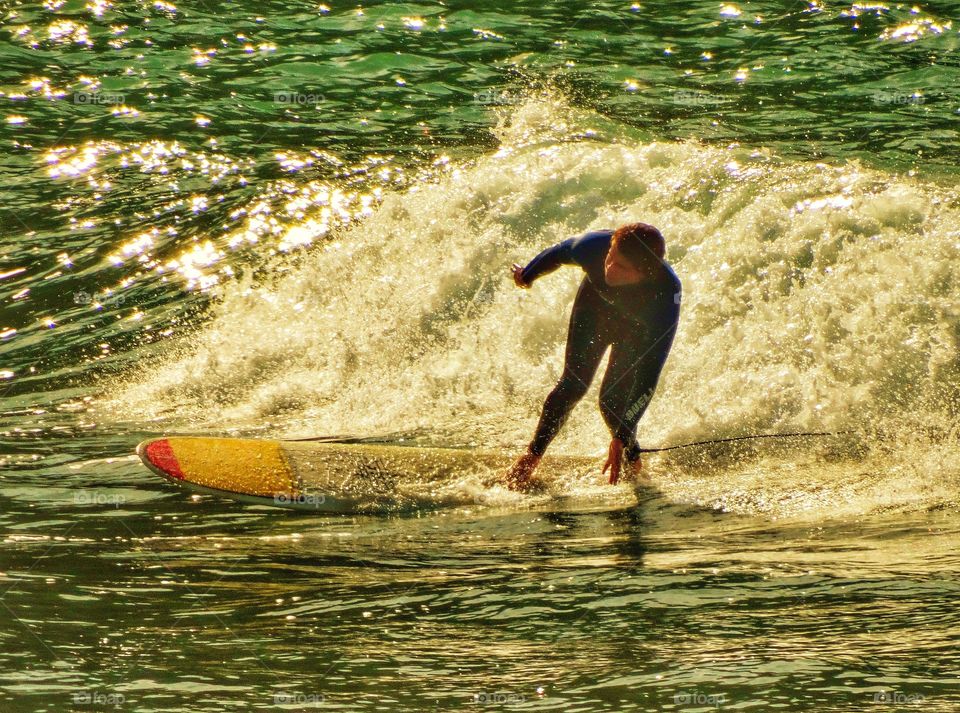 Surfer On A Longboard in Pacifica, California