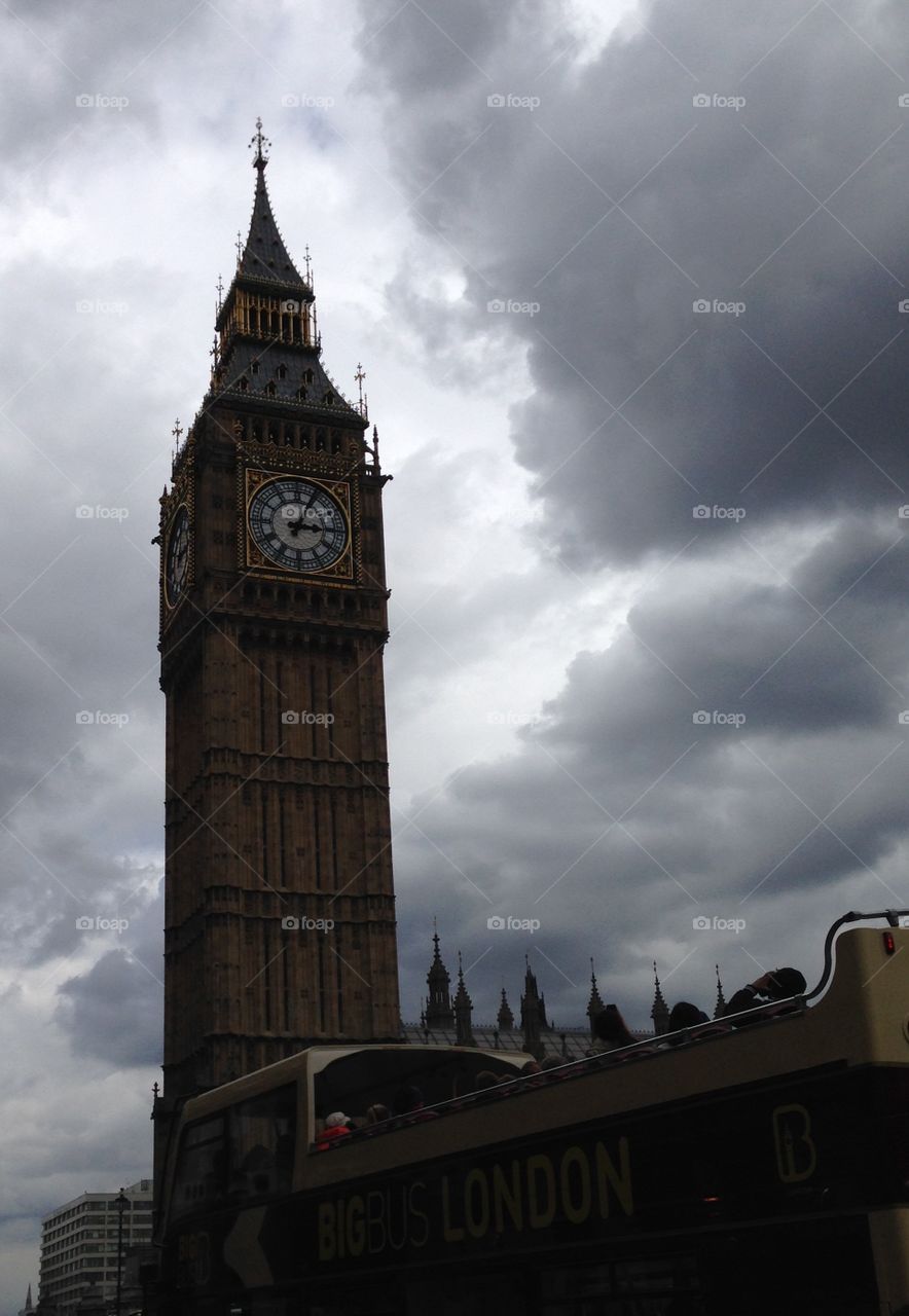 Brooding Ben. Big Ben with a backdrop of a threatening grey London sky makes it appear like Big Ben is in a brooding mood