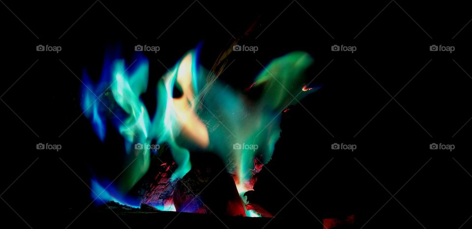 Dancing green flames