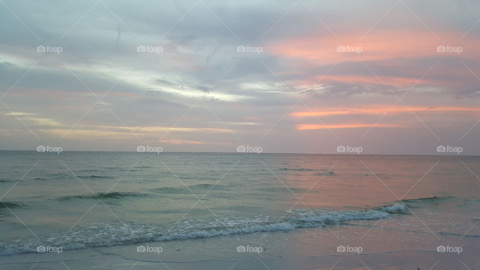Cloudy beach sunset