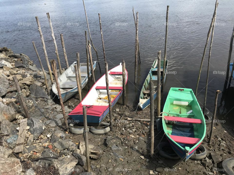 fishing boats moored at the port of Caravelas, Bahia