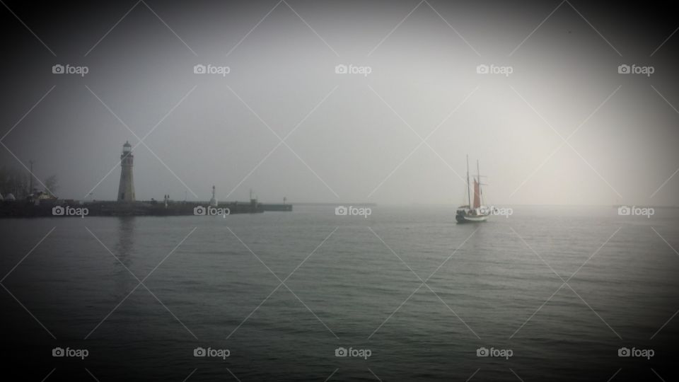 ship on foggy lake. ship on foggy  lake