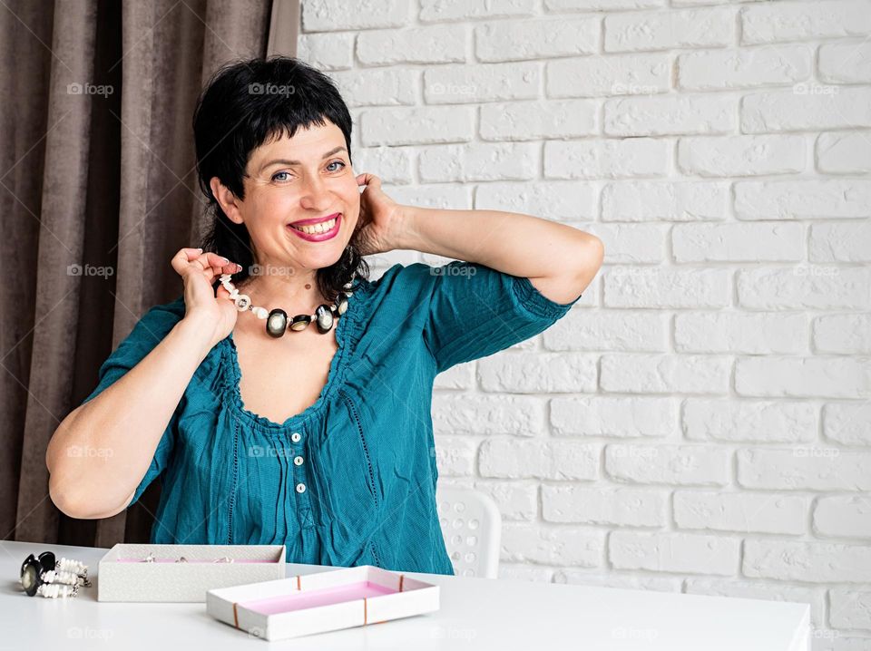 Beautiful Middle Age Woman with jewelry