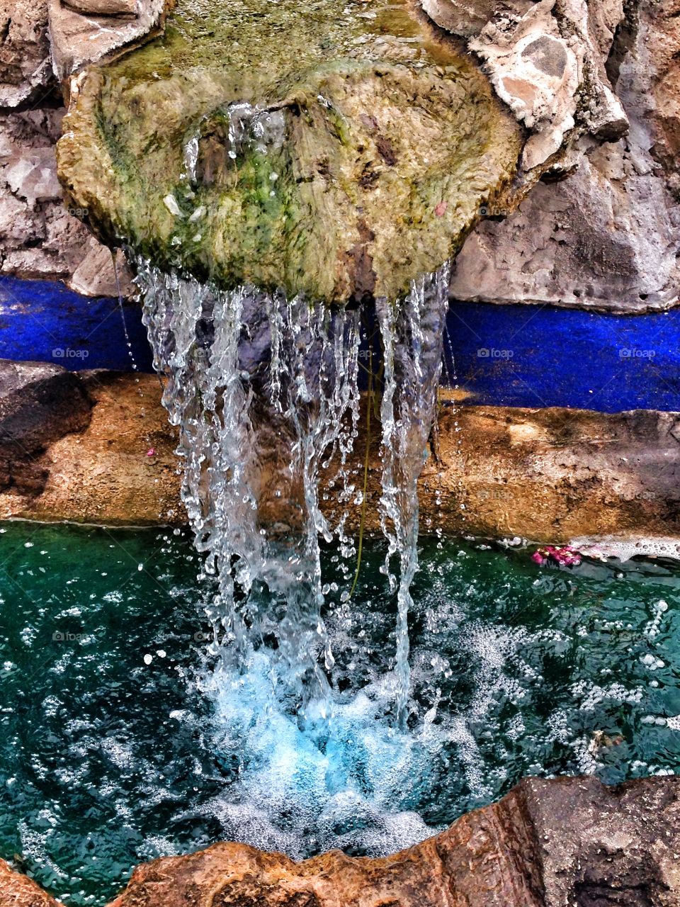 Soothing sounds. Waterfall at mini golf course 