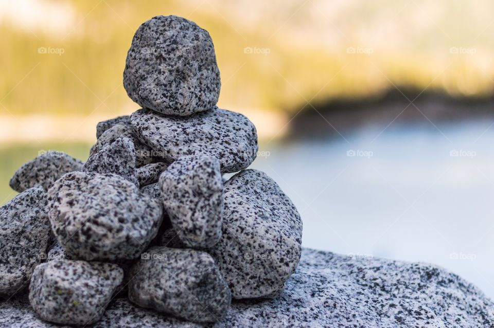 Rock cairn above a lake in the enchantments.
