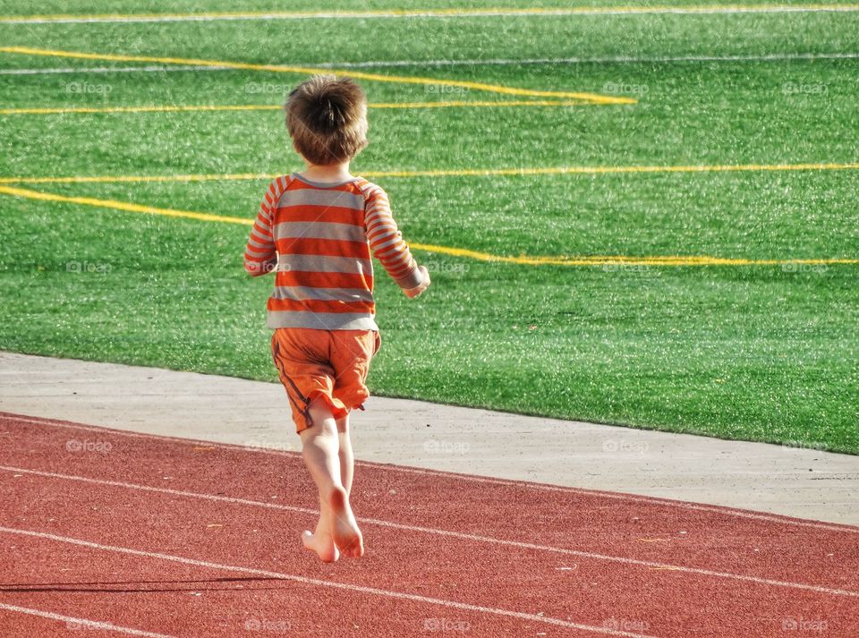 Young Barefoot Runner