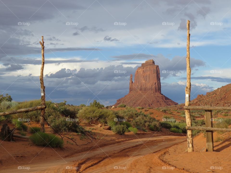 Monument Valley. Dirt road in Monument Valley, AZ in the late afternoon
