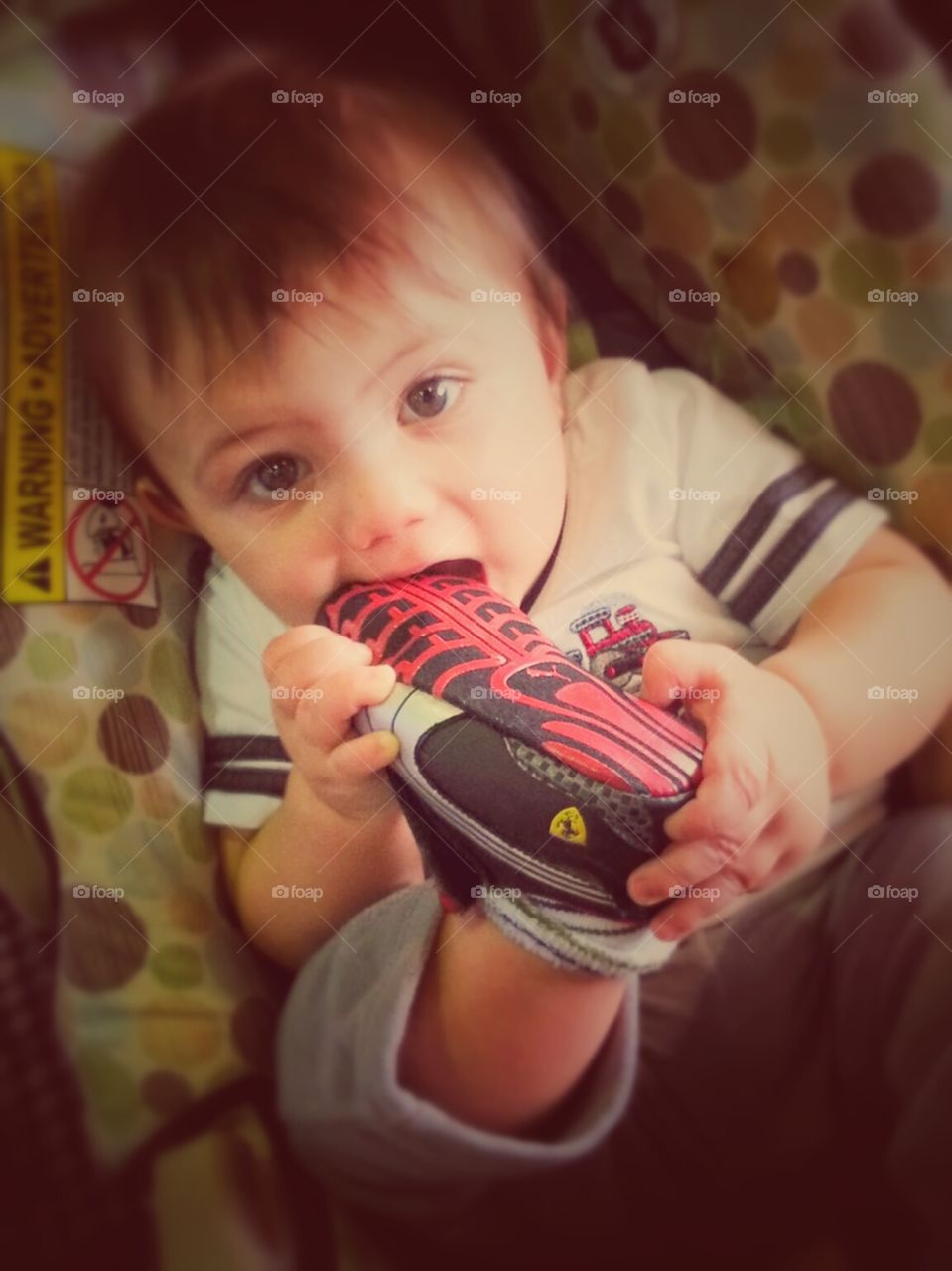 Hungry for some Cuteness? Just take a look at my adorable godson when he was younger. He loved his puma ferrari shoes so much that he wanted to eat them!