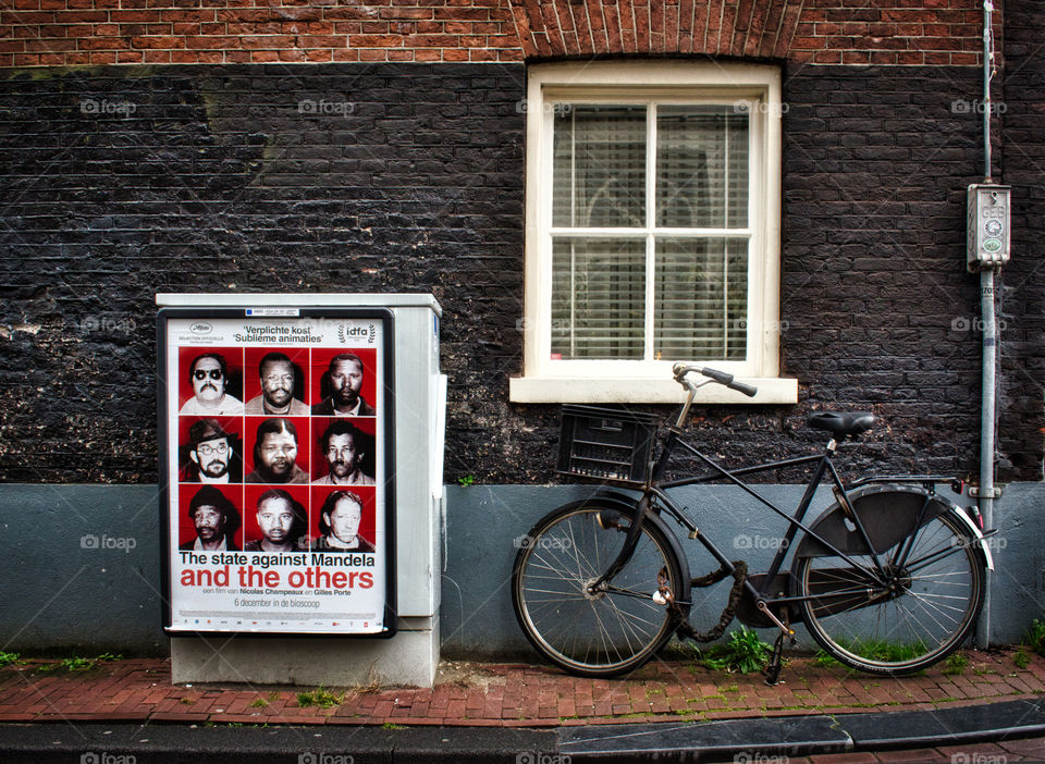 Poster, window and bike