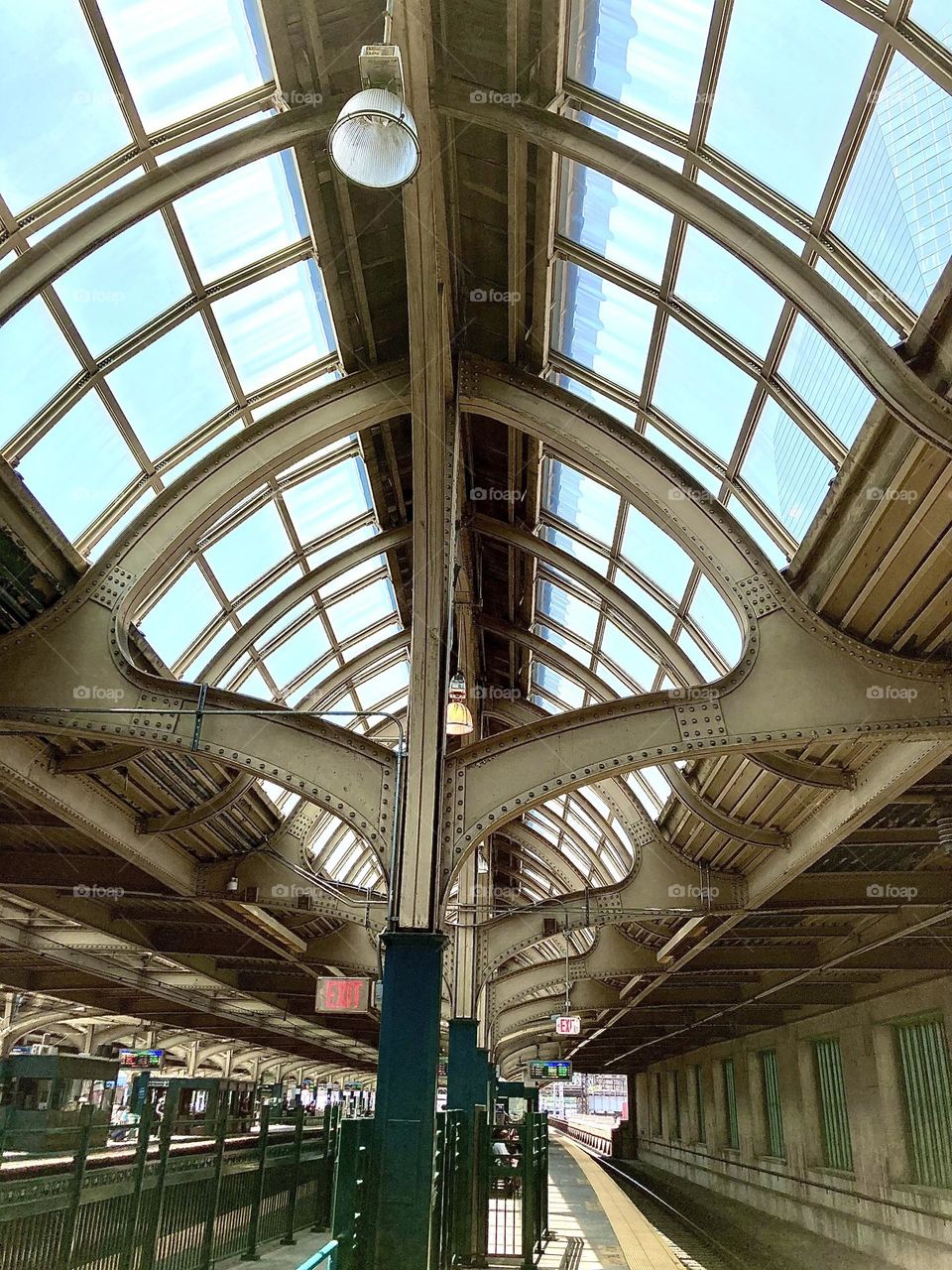 Glass and steel barrel ceiling inside the 30th street station in Philadelphia, PA where over 3 million passengers pass yearly.
