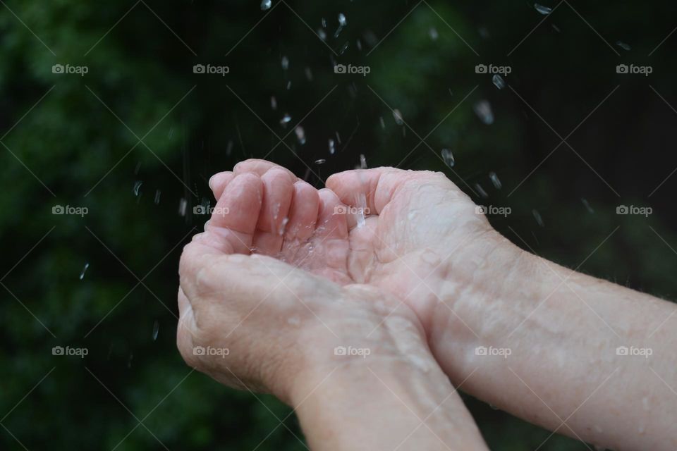 water drops in the hands