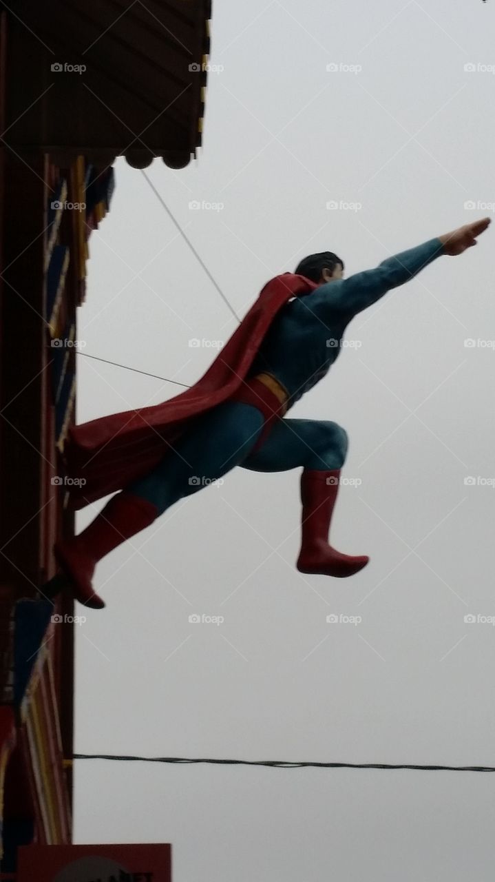 Superman.  Metropolis,  Illinois.   over hangs a tourist trap downtown.