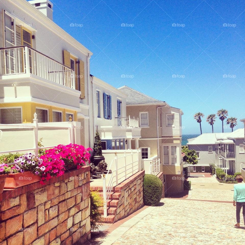 Quaint seaside village with pretty homes, ocean views, cobbled streets and palm trees. Ideal lifestyle. 
