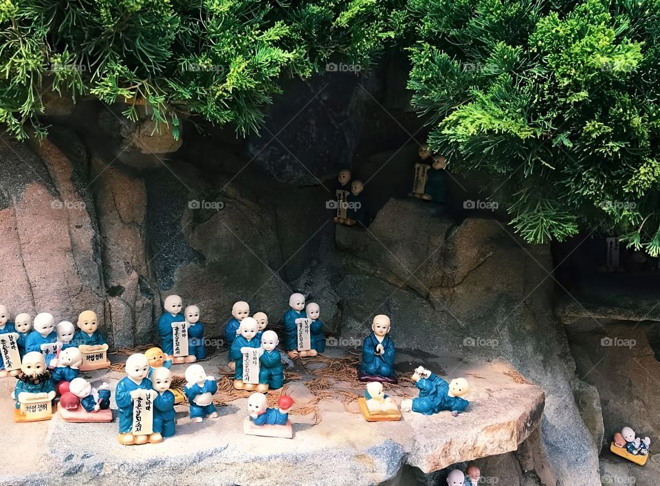 monk doll in japan forest