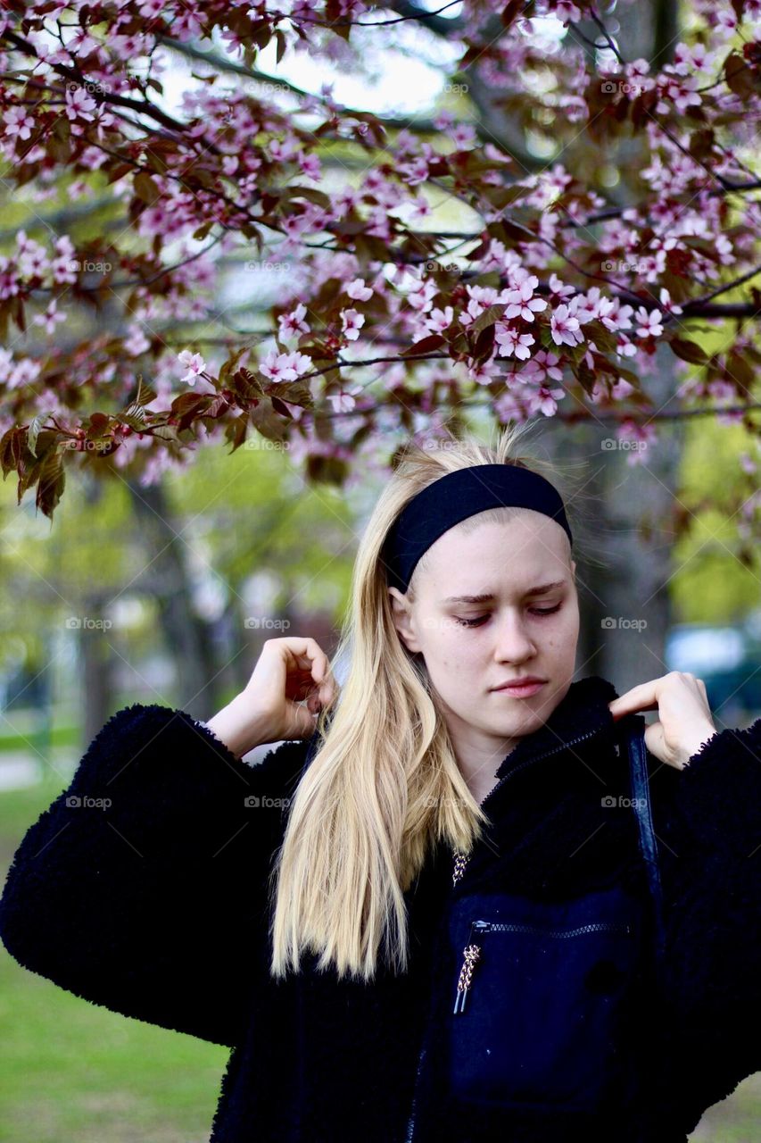 Natural girl under cherry tree