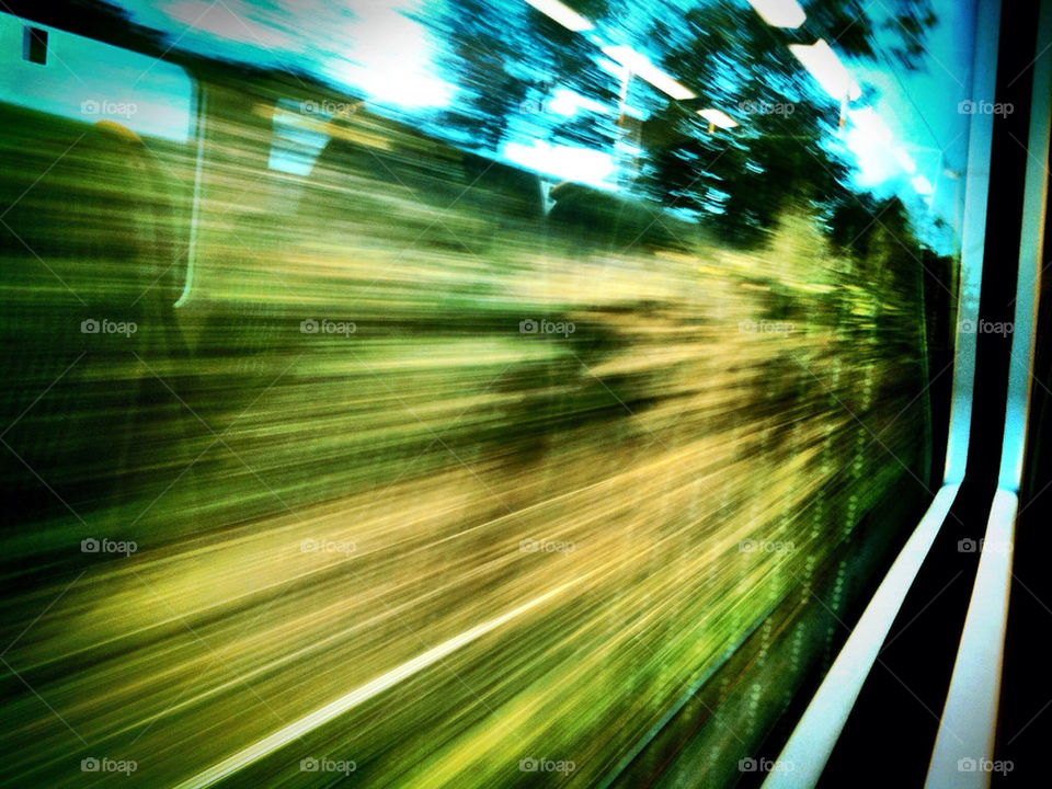 Watching the world fly by from the train.