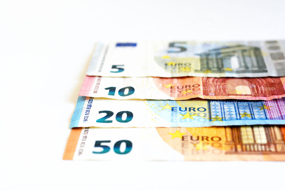 Euro money banknotes on white