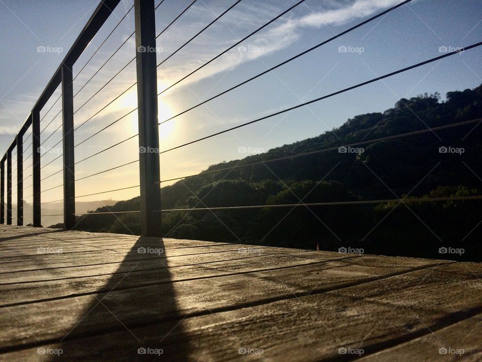 Shadow work- sun behind the handrail 