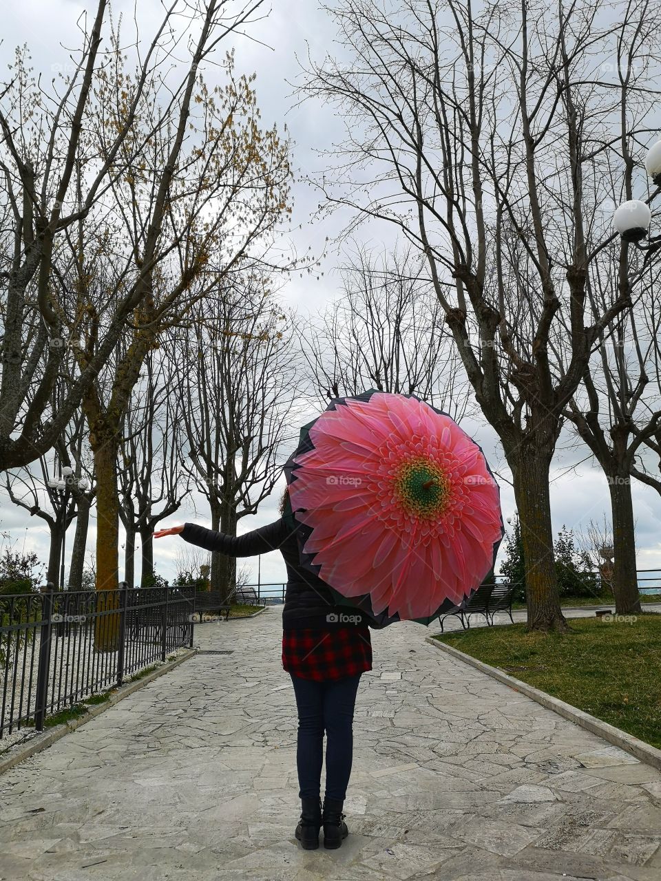 Girl with an open umbrella ... It's going to rain