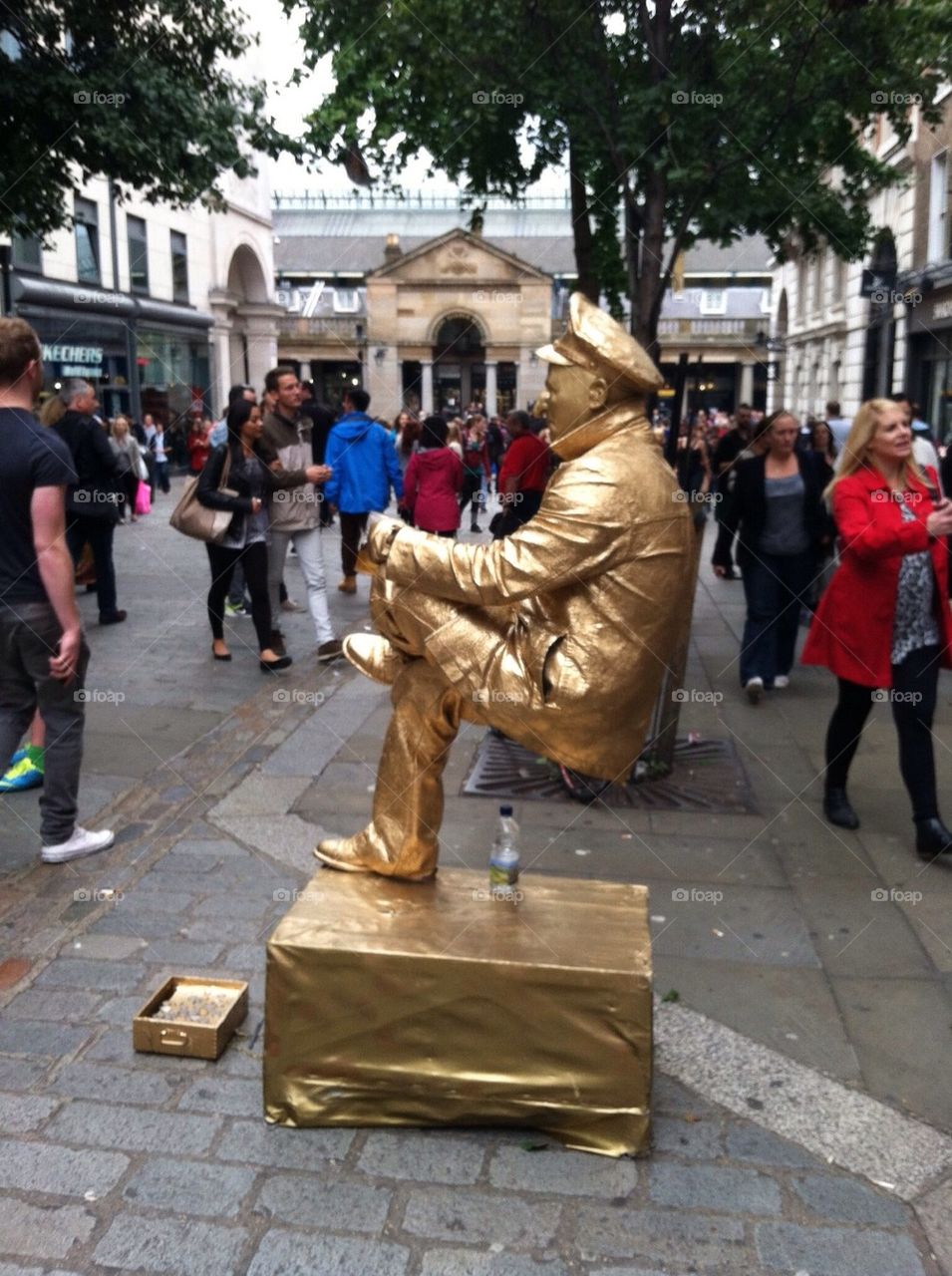 Street performer in gold
