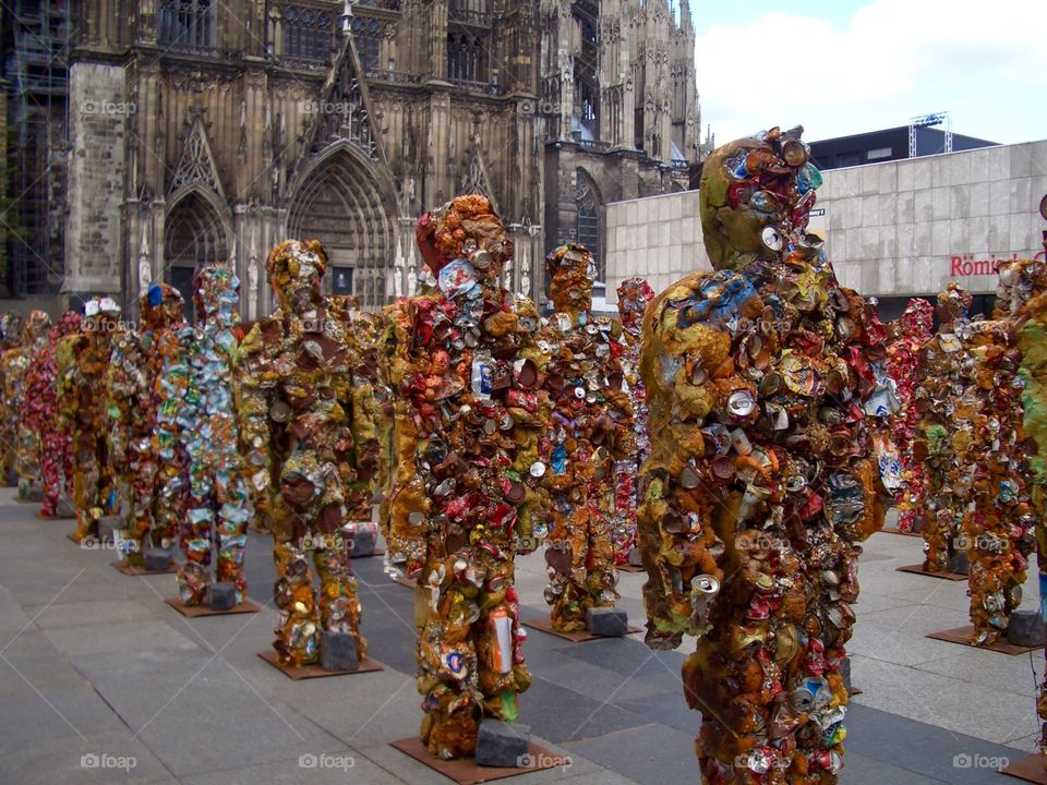 Modern exhibition of garbage sculptures in a square near Cologne Dome