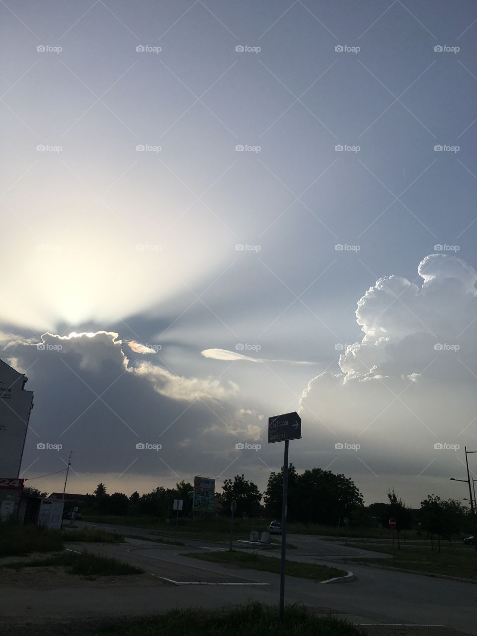 The sun is playing with the clouds