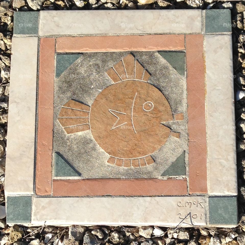 Fish mosaic stepping stone