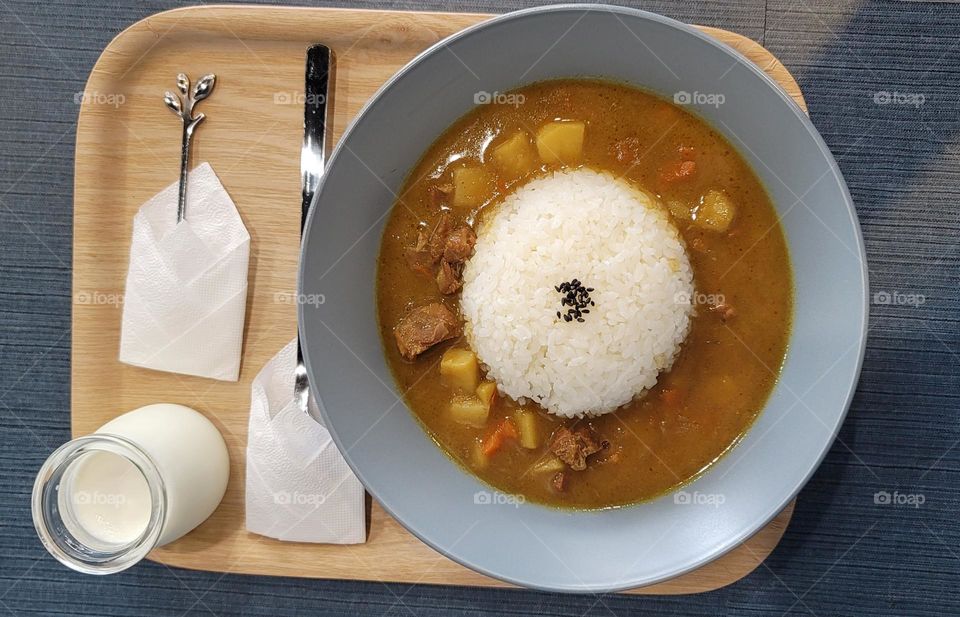 Curry rice with potatoes, carrots and beef