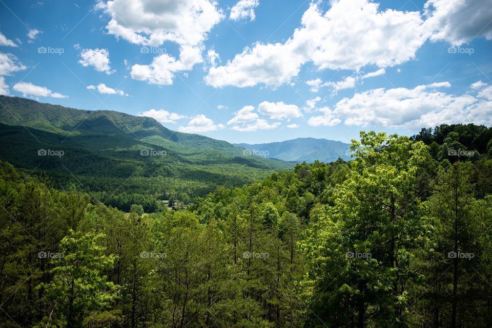 Landscape image of the Smoky Mountains on a clear,sunny day in Gatlinburg, Tennessee 
