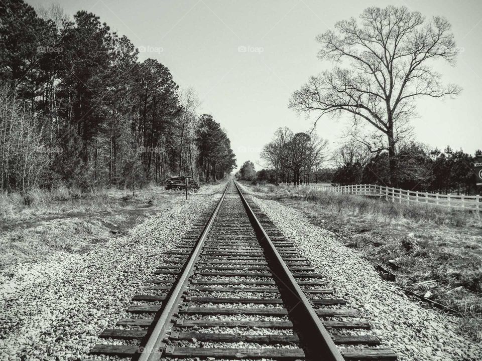Black and white shot of railroad track