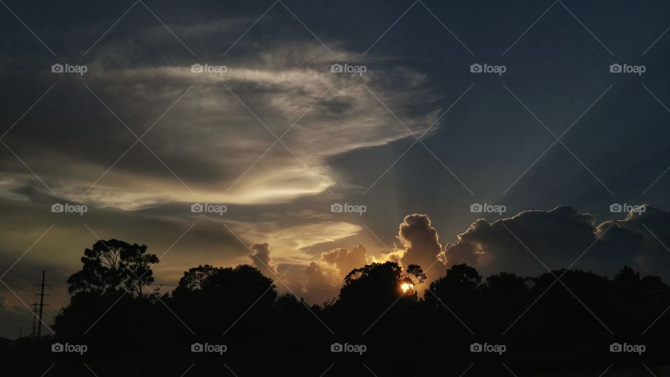 Sun rays through clouds