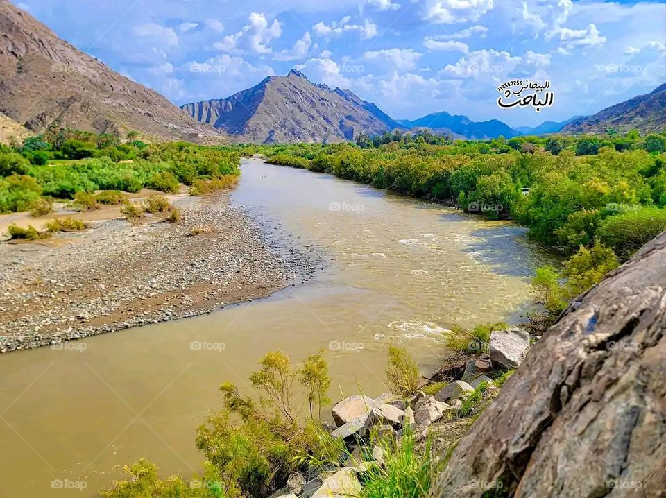 Glory be to God, the magnificent and picturesque view and the natural green trees are a view that is nothing more wonderful than it